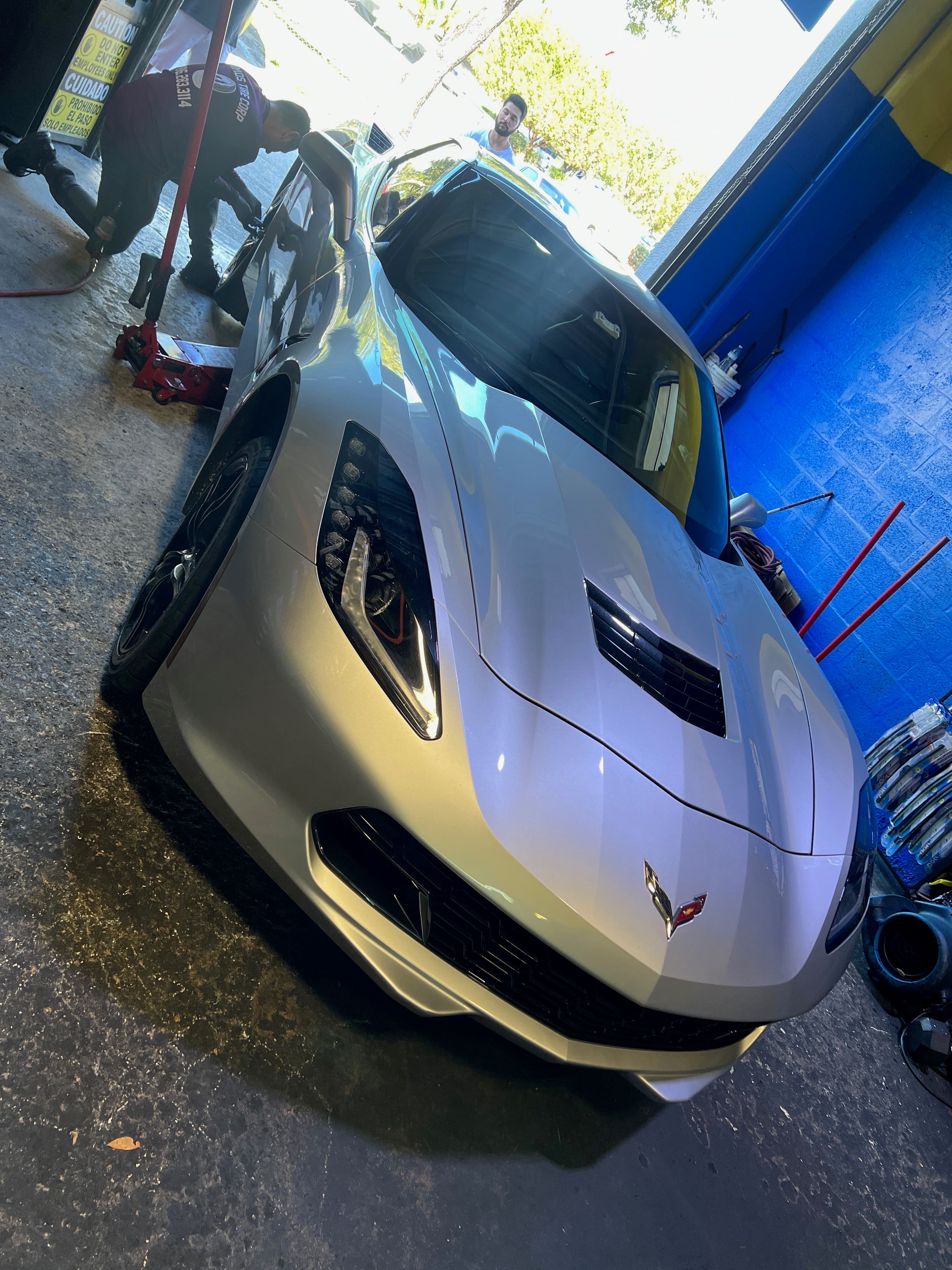 White Corvette Professional Service